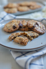 A plate of fresh baked oatmeal and chocolate chip cookies