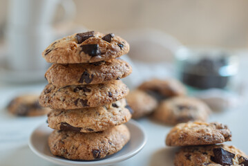 A plate of fresh baked oatmeal and chocolate chip cookies