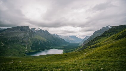 Upright perspective of hills and lush meadows beneath a stunning cloudy sky.
