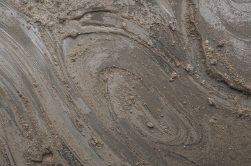 Naklejka premium Texture of freshly mixed gray mortar or concrete surface