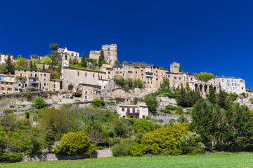 Fototapeta premium Montbrun les Bains village perched on hillside in Drome, France