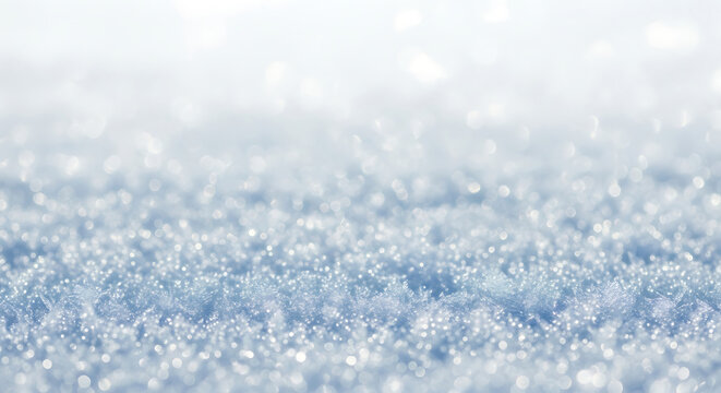 Close up of sparkling snow crystals on a bright winter day