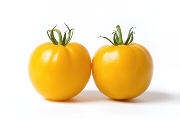 Pair of yellow tomatoes isolated on a white background