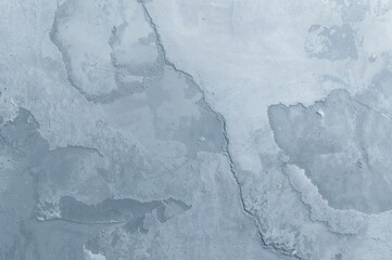 Obraz premium Textured wall surface with cement plaster in gray-blue shade