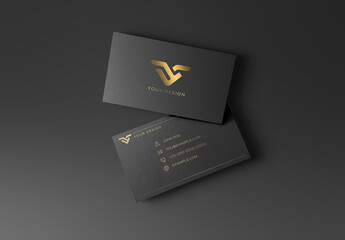 Two Black And Gold Business Cards On Isolated Background Mockup