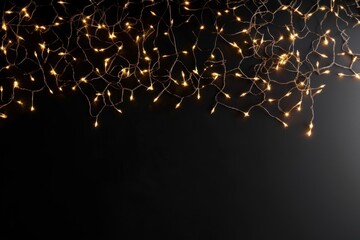 Naklejka na ściany i meble Twinkling string lights on black