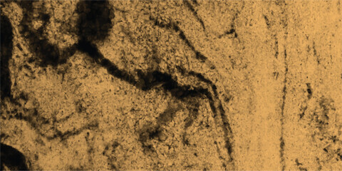 Close up textured background of rough sandy surface with dark abstract shadow patterns and grainy detail in warm sepia tones for a natural feel