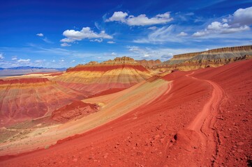 The hillside showcasing a spectrum of seven hues with red clay and diverse minerals