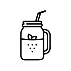Mason jar with straw and mint leaves filled with refreshing drink  