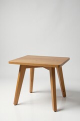 A simple, stylish light wood coffee table with sturdy legs, perfect for a modern living room or minimalist apartment.