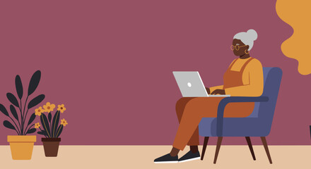Senior Black woman working on laptop at home embracing technology and remote lifestyle