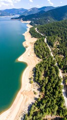 Lakeside road through forest