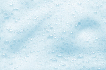 The texture of detergent foam or shampoo or shaving gel. Cosmetic skin care product.