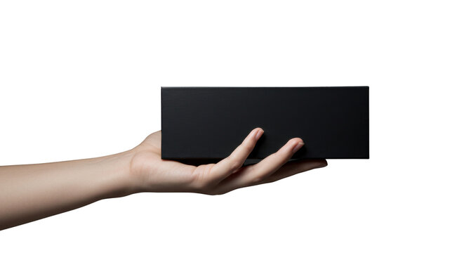 Hand holding a generic small black rectangular electronic device or product packaging isolated PNG with Transparent Background