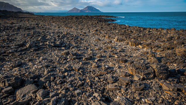 Coastline featuring columnar granite and solidified lava resembling cobblestone or scales
