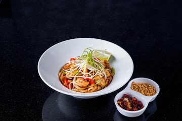 Traditional Chicken Pad Thai Noodles in a White Bowl