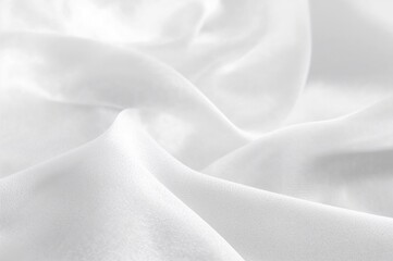 Obraz premium Softly textured fabric featuring gentle waves and delicate designs in a pale single color scheme.