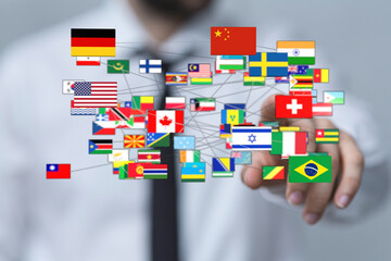 A person touching flags representing the world. Concept of global connection, international...