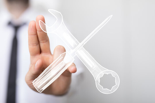 Image of a businessman presenting virtual tools, symbolizing repair, maintenance, solutions, and technical support.