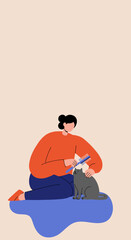 Person gently brushes a content cat at home showcasing pet care and animal bonding