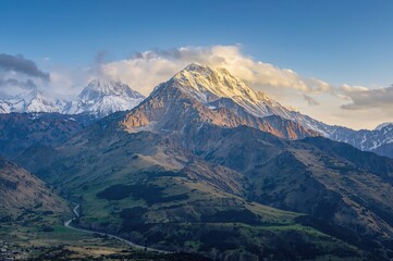 Fototapeta premium Snow-Capped Summit in a Remote Valley
