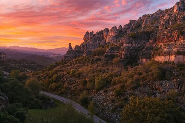 Fototapeta premium Dusk over the towering rock formations in a scenic mountain region