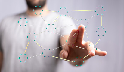 Abstract image depicting a man interacting with a digital network, showcasing connection and...