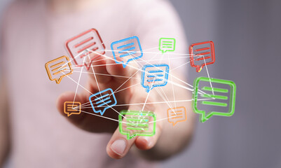Close-up of hand reaching for digital message icons representing concepts like communication, social media, connection, and global networks.