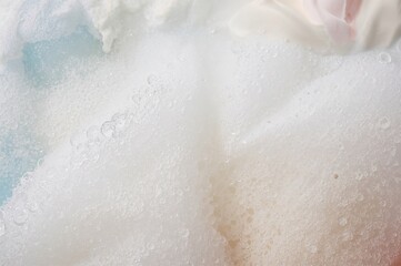 Fototapeta premium Lather and foam form while cleansing with soap or shampoo. Image.