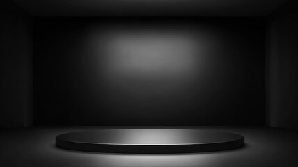 black pedestal illuminated by a spotlight,