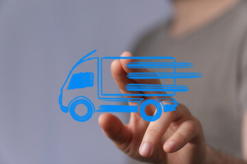 Hand interacting with a fast delivery truck icon.  Perfect for logistics, shipping, and transportation concepts.