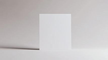 Blank white paper for message or advertisement.  Space for customization, perfect for graphics or messages.  Simple and minimal.  Poster mockup.