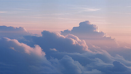 A breathtaking view of fluffy clouds illuminated by the warm glow of a sunset, blending pink, lavender, and blue tones in a tranquil sky.