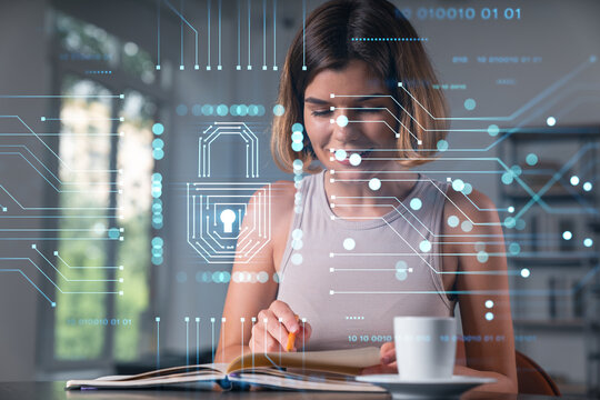 Woman studying with cyber security interface overlay indoors, concept of digital privacy and technology integration in education environment.