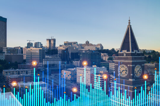 Modern economic growth concept over Seattle cityscape with digital bar charts and clock tower in focus at sunset. - Powered by Adobe