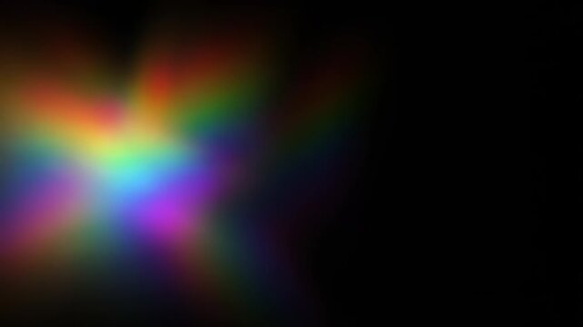 Abstract Rainbow Lens Flare Starburst Overlay. Ethereal Light Leak Animation with Spectrum Prism Effect on Black Background.