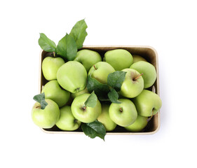 Ripe green apples with fresh leaves in wooden crate isolated on white, top view