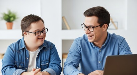 Colleagues enjoying teamwork on a graphic design project in a bright office setting