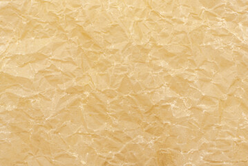 Texture of old crumpled parchment paper. Recycled paper. Kraft packaging material background
