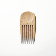 Wooden hair comb in flat lay style on white background  