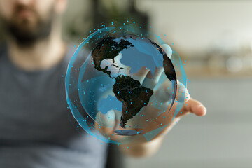 Close-up of a man's hand reaching out.  Perfect for concepts of connection, help, or interaction.