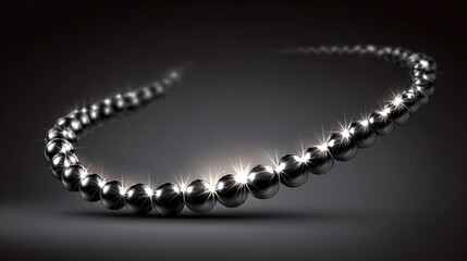 Elegant necklace of spherical beads with reflective surface on black background