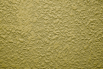 Yellow background. Abstract texture of plaster or wallpaper.