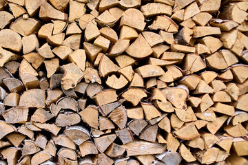 Stacked firewood in natural tones