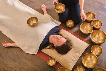 Relaxation with singing bowls in calming environment