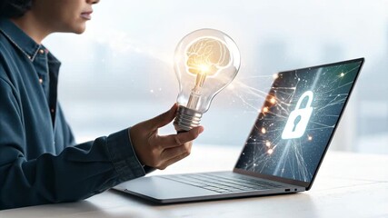 Business professional holding a glowing lightbulb with a brain inside, linking creative intelligence with digital cybersecurity on a laptop. - Powered by Adobe