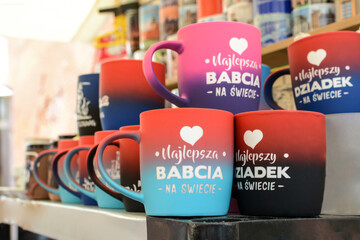 Gift cups are sold in the souvenir shop in the city center. 