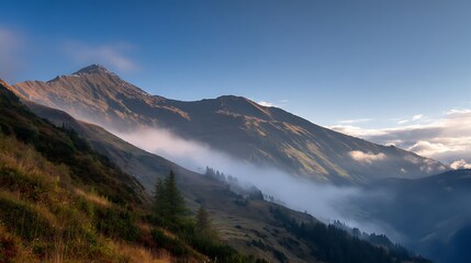 Scenic mountain landscape with fog and clouds in the alps on sunny day