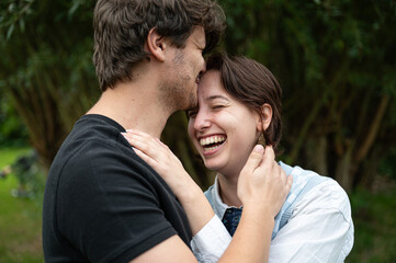 19 yo white couple with male and female holding each other in love, Borchtlombeek, Belgium