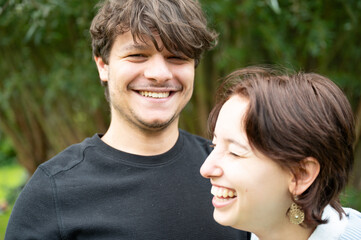 19 yo white couple with male and female holding each other in love, Borchtlombeek, Belgium